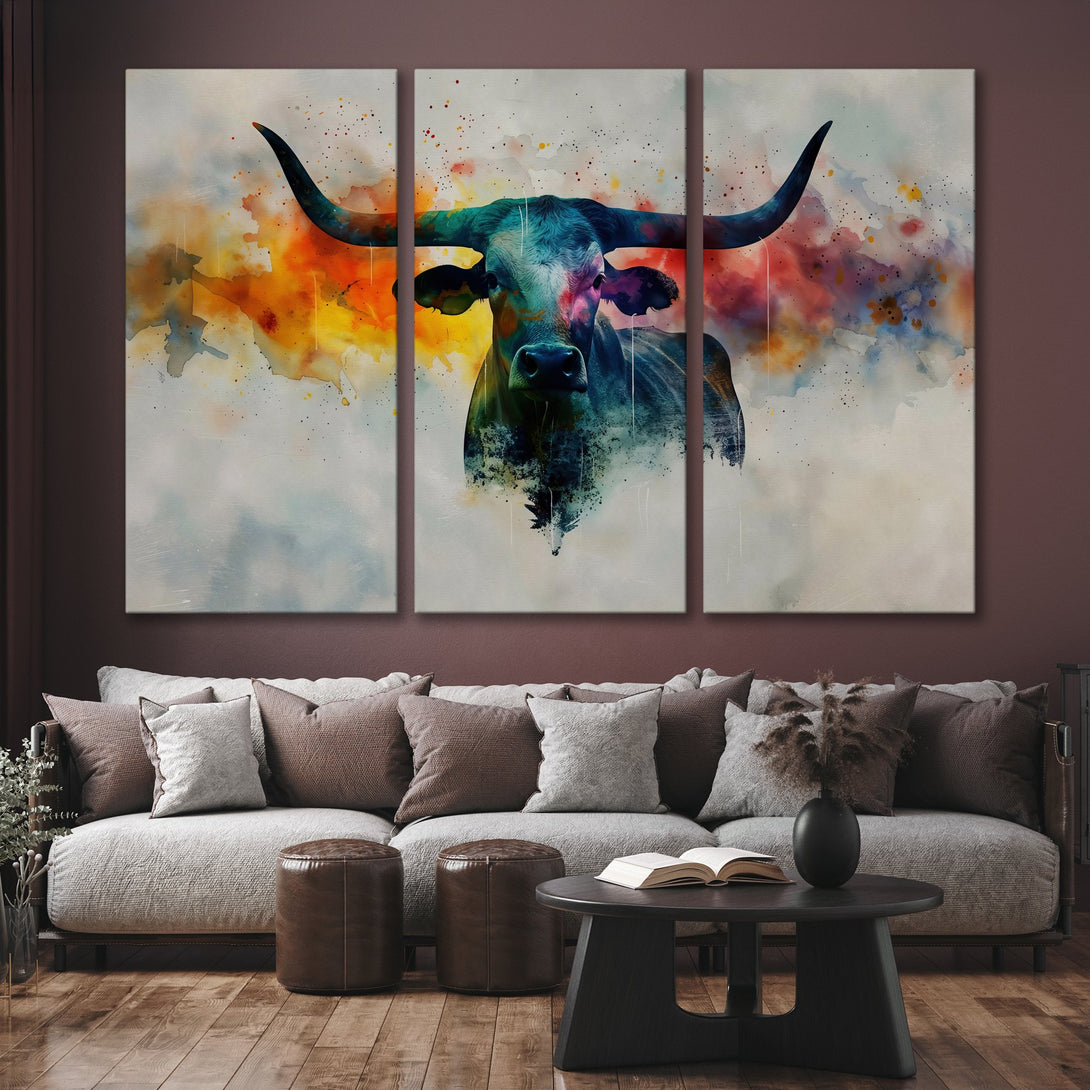 Canvas Print of a watercolor bull in vibrant blues, oranges, and reds. Modern wall art for home decor.