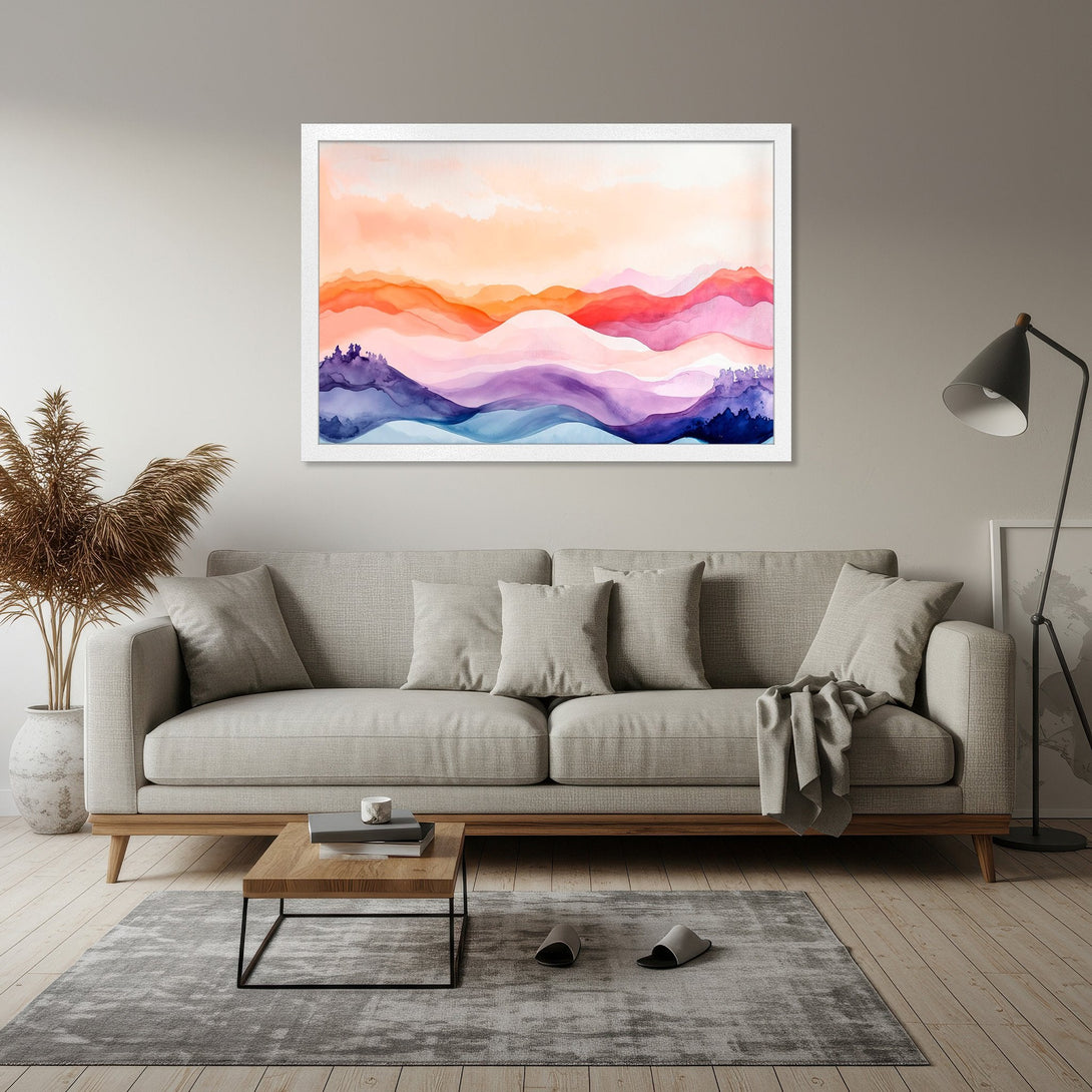 Framed Poster featuring watercolor mountain landscape art in a warm, vibrant color palette of orange, pink, purple, and blue. Perfect wall decor.