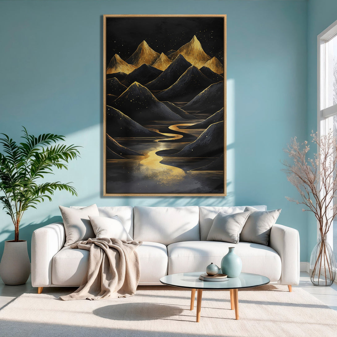 Framed Wall Art featuring a gold and black mountain landscape. Modern art print with a serene, elegant color palette. Perfect for living room decor.