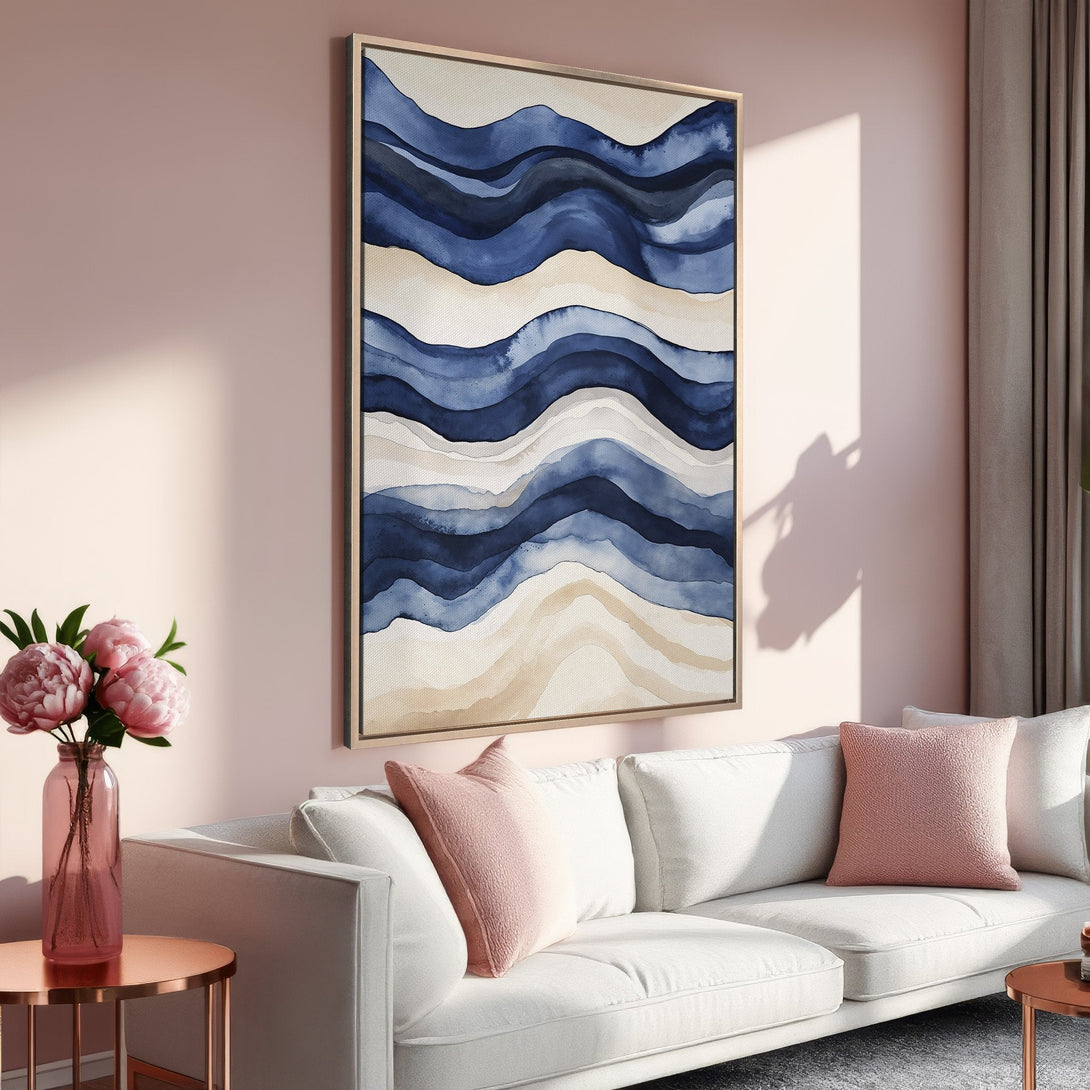 Framed Wall Art featuring abstract blue watercolor waves. Modern art print with a calming, neutral color palette. Perfect for living room decor.