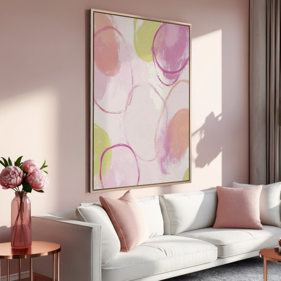 Framed Wall Art featuring abstract pink & green circles. Modern canvas print adds a pop of color to any space. Shop our art collection today!