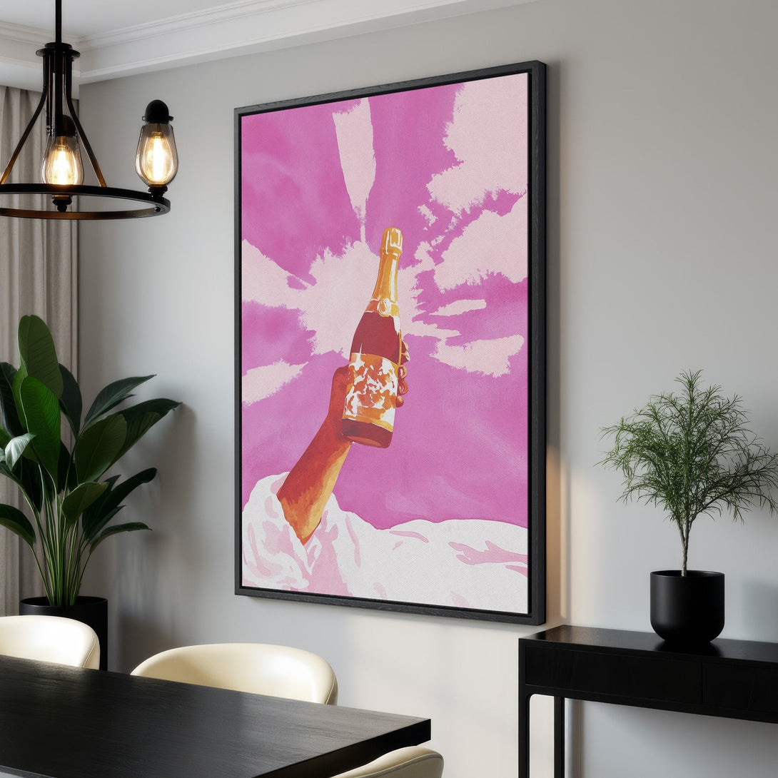 Framed Wall Art: Pop art style canvas print of a hand holding champagne bottle against a pink background. Perfect for adding a splash of color!