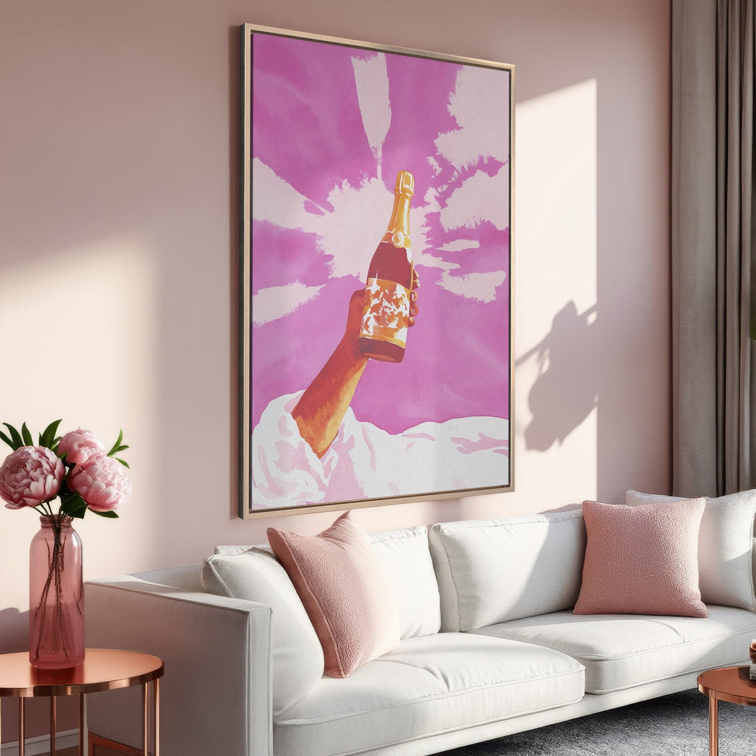 Framed Wall Art: Pop art style canvas print of a champagne bottle against a pink sky. Stylish decor in a blush and gold color palette.