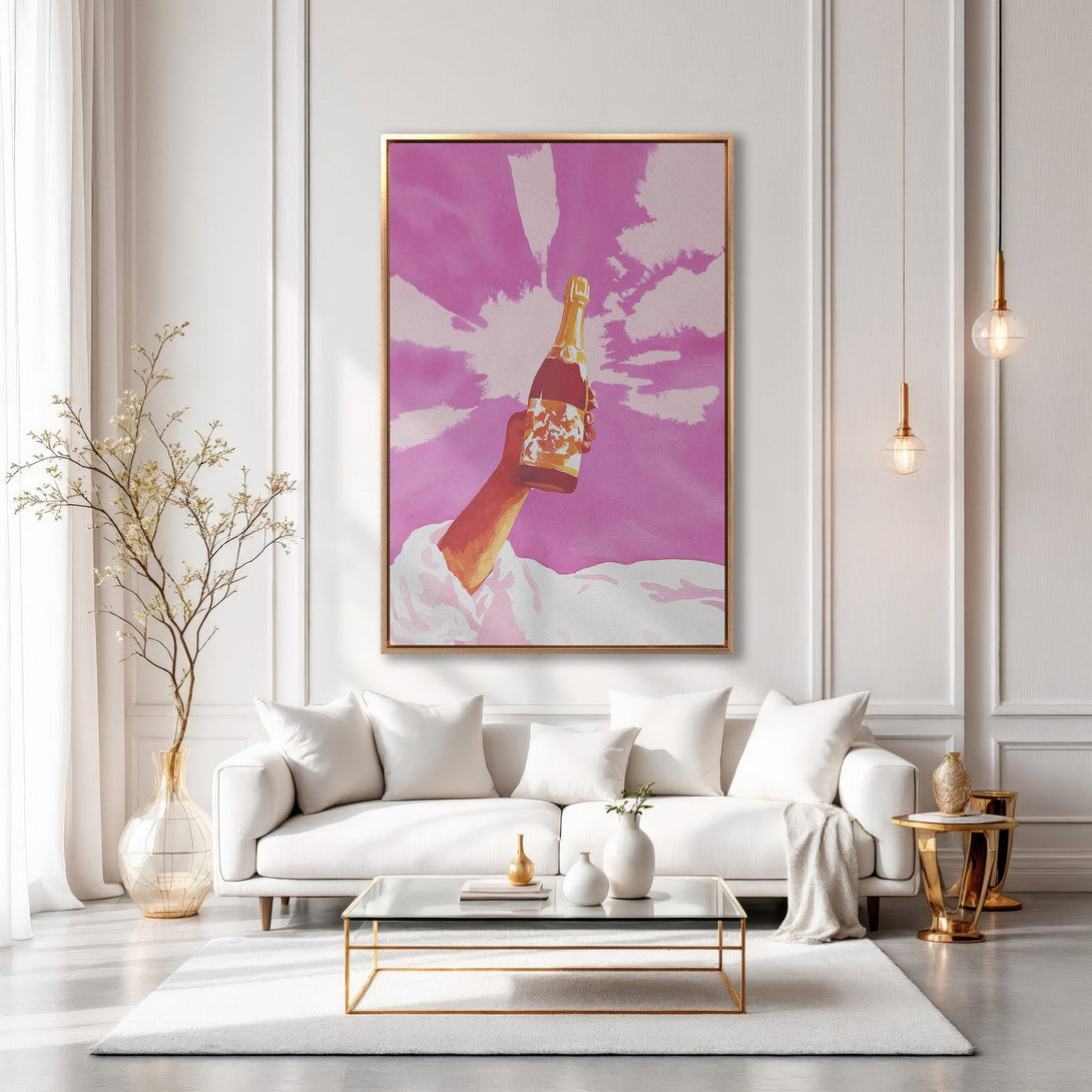 Framed Wall Art: Pop art style canvas print featuring a champagne bottle against a pink sky. Modern interior decor with gold and white accents.