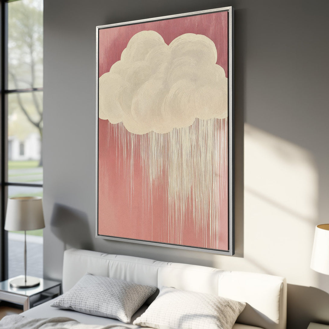 Framed Wall Art featuring a whimsical cloud design in a soft pink and cream color palette. Perfect for adding a touch of modern art to your bedroom decor.