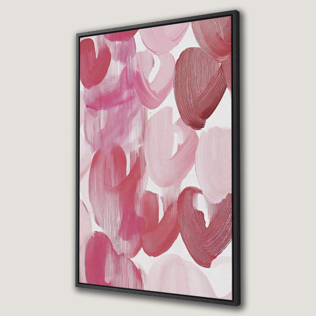 Framed Wall Art featuring abstract brushstrokes in a pink and red color palette. Modern art perfect for adding a pop of color to any room.