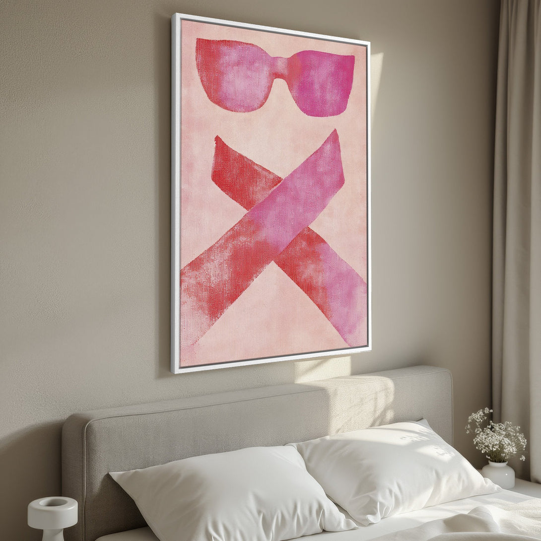 Framed Wall Art: Abstract pink art print with sunglasses and ribbon design. Modern decor in a bedroom setting with a blush and red color palette.