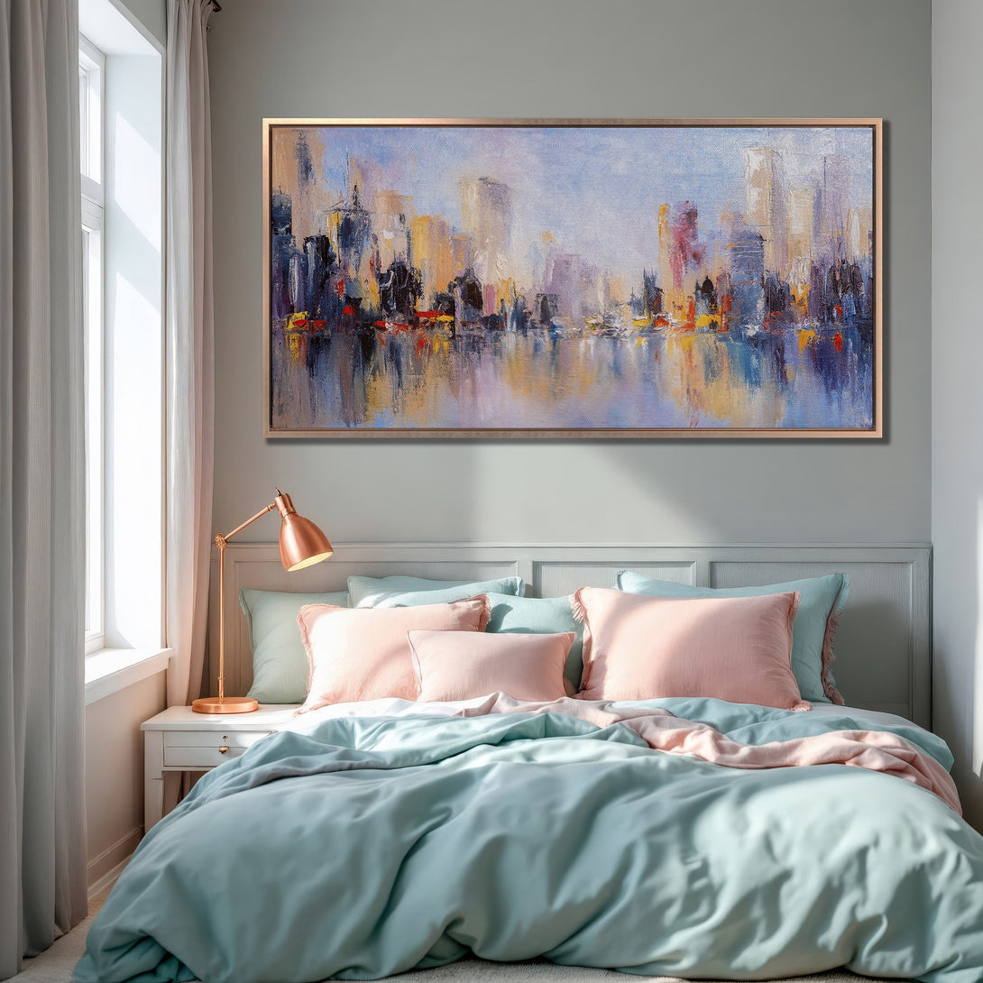 Framed Wall Art: Abstract city skyline painting in a bedroom. Features a warm color palette of blues, oranges, and yellows. Perfect for modern decor.