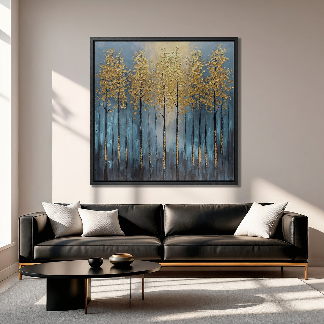 Framed Wall Art featuring a gold leaf forest painting in a modern interior. Blue and gold color palette creates a luxurious, artistic ambiance.