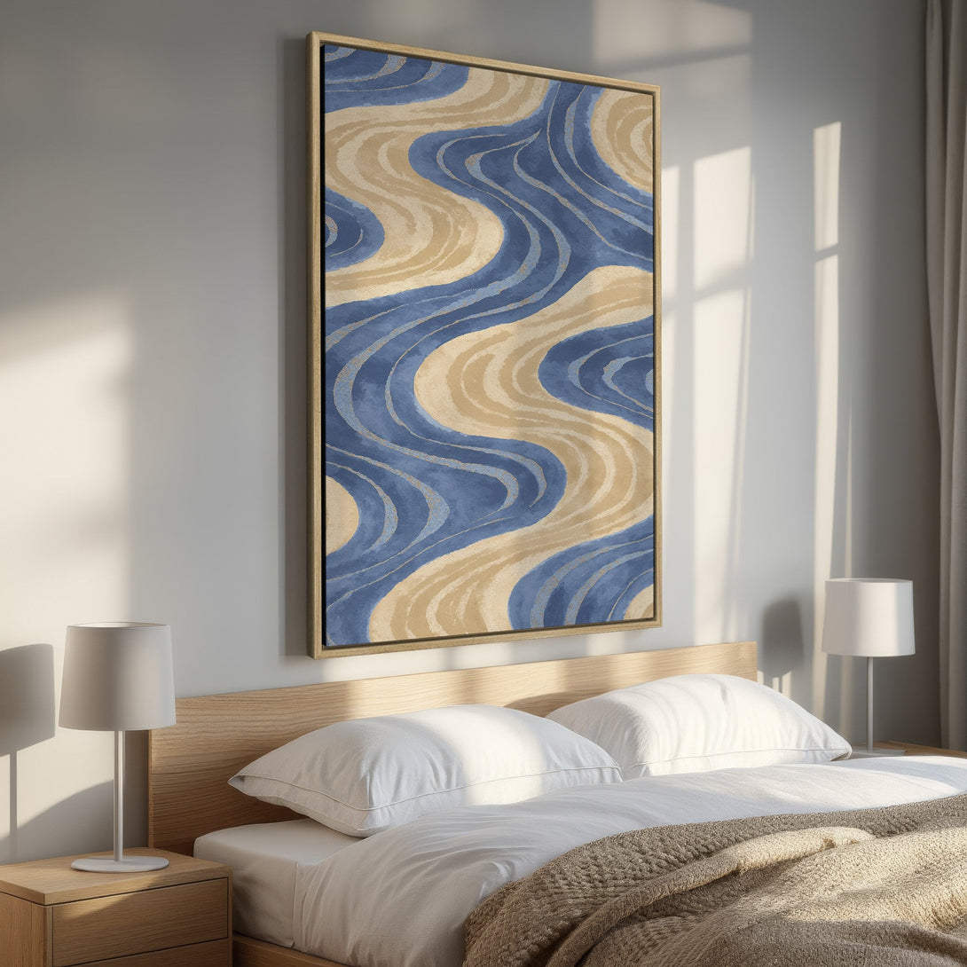 Framed Wall Art: Abstract wave design in blue and beige tones. Modern Canvas Print adds a calming touch to bedroom decor.