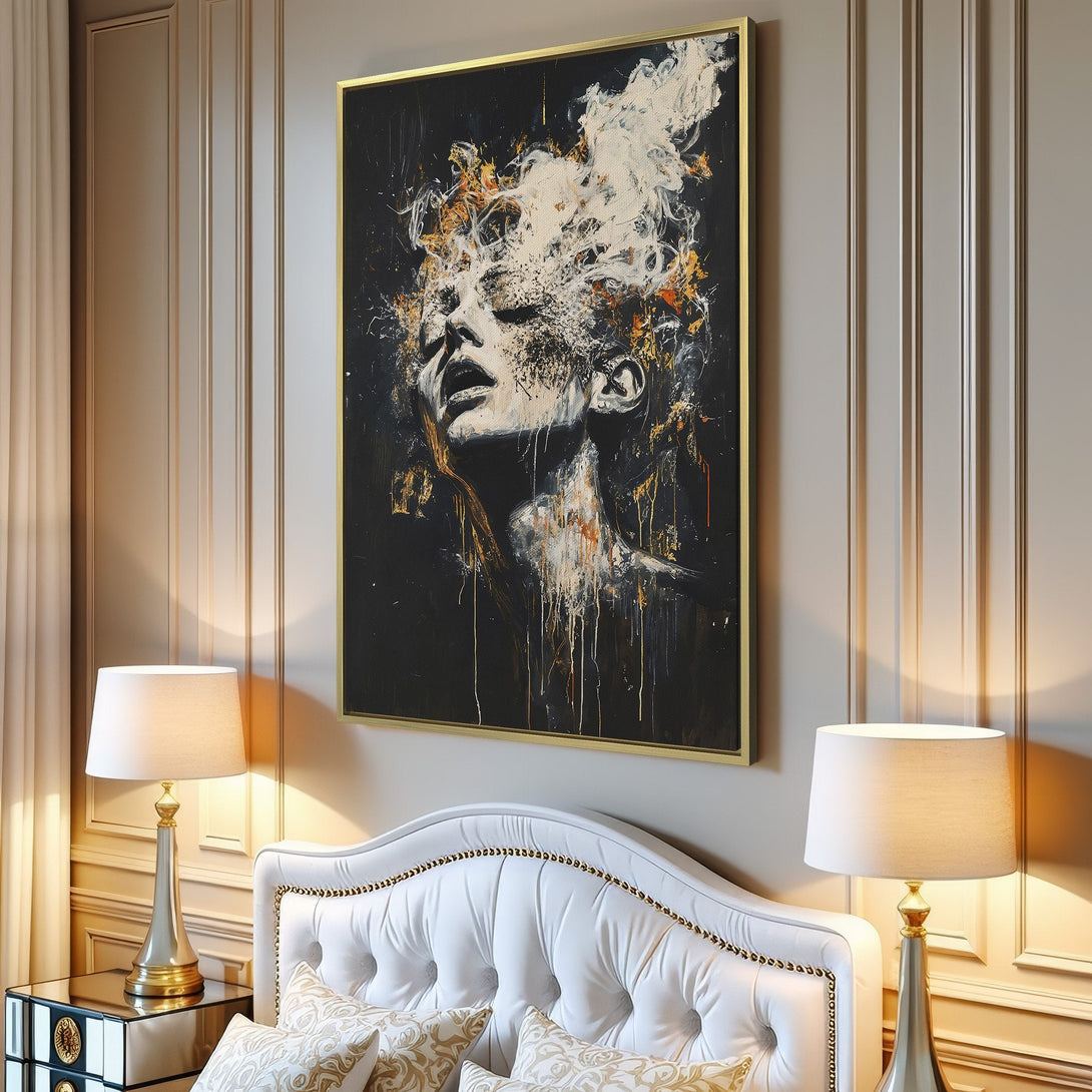 Canvas Print of a woman's face in abstract style, with a dark, gold, and white color palette, displayed in a modern living room.