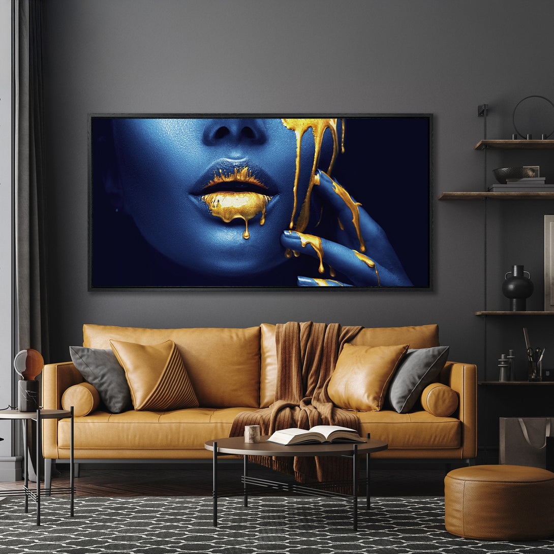 Framed Wall Art: Stunning blue and gold abstract portrait canvas print, adding a touch of luxury to any interior. Modern art with a bold color palette.