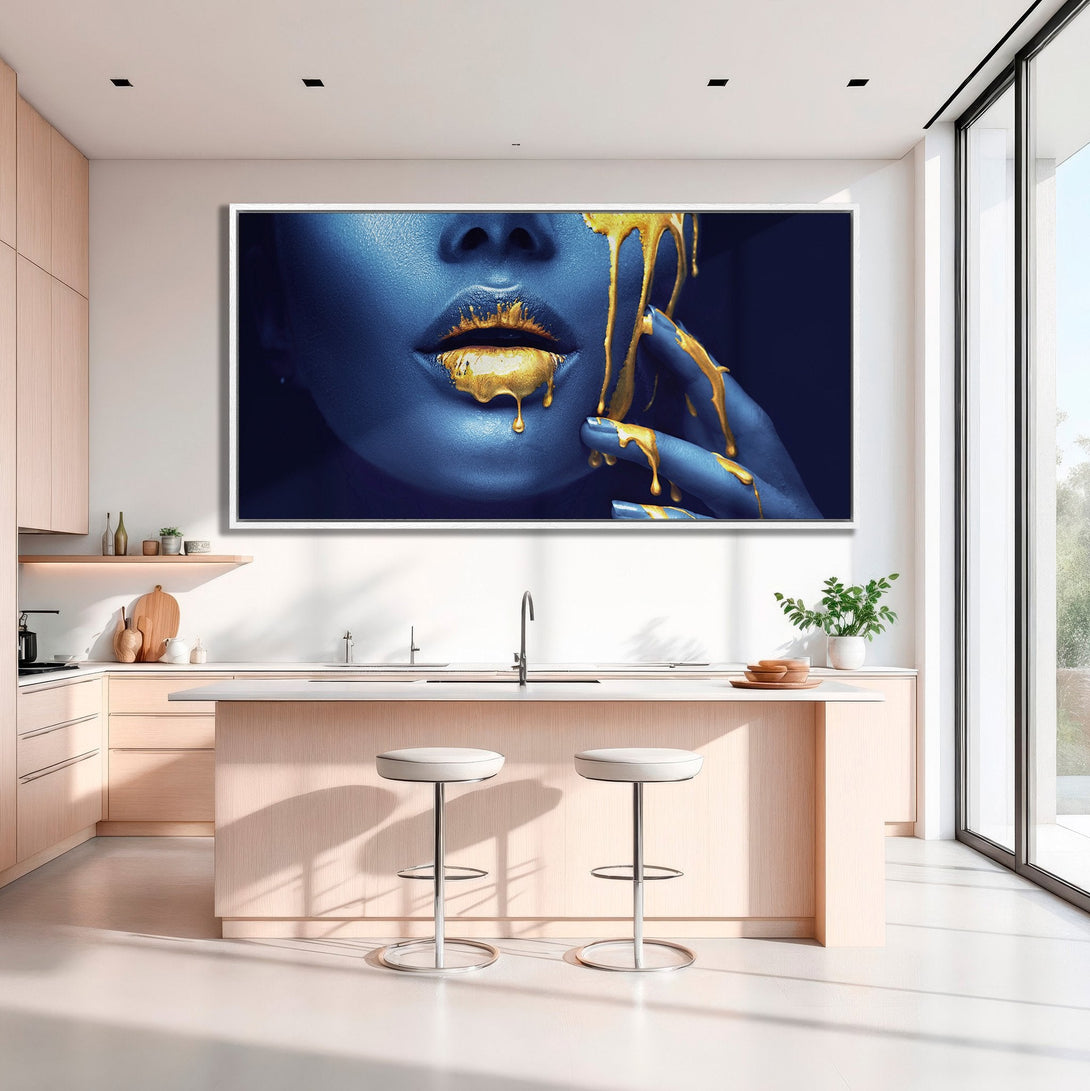 Framed Wall Art: Blue lips with gold dripping. Modern Canvas Print in a contemporary kitchen, featuring a striking blue and gold color palette.