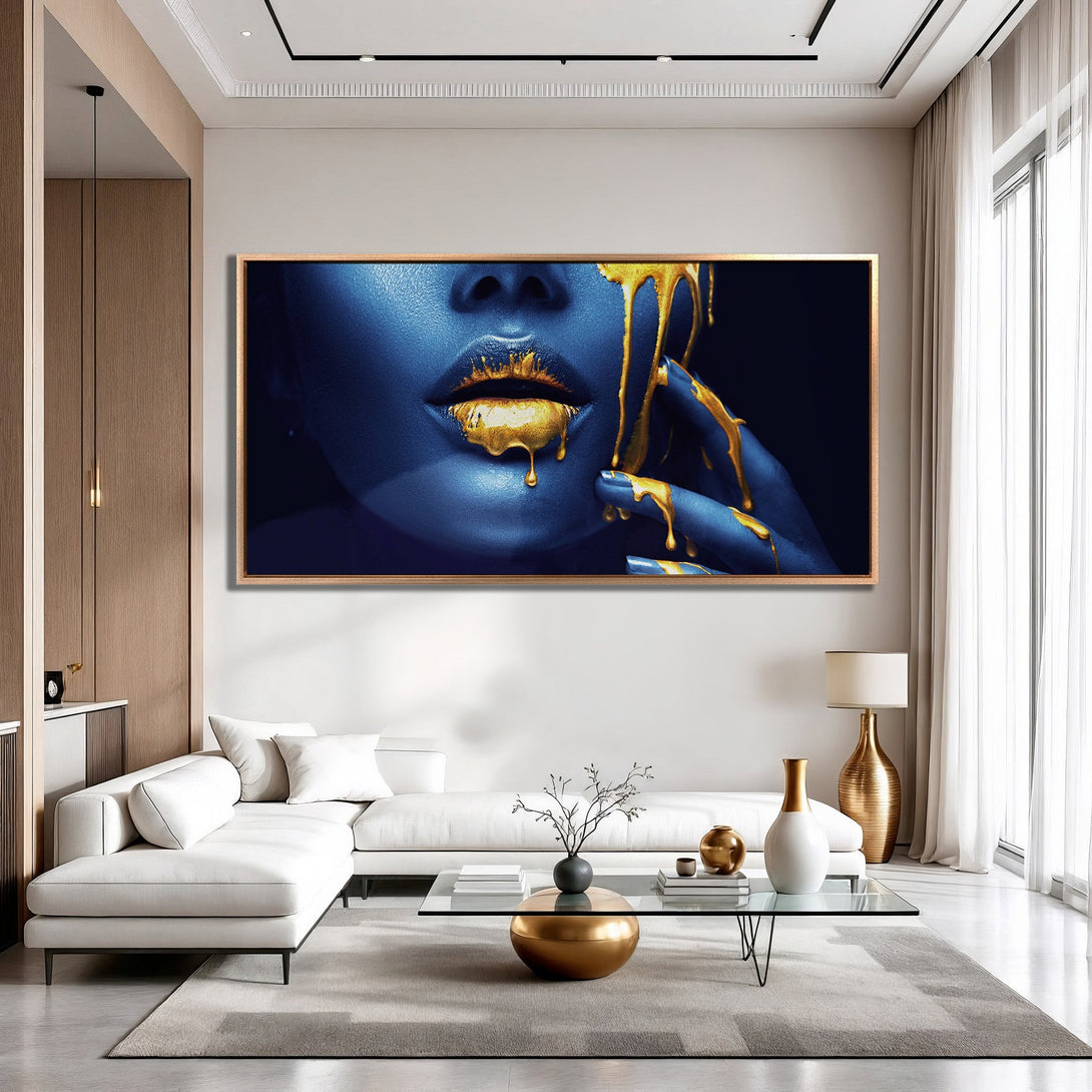 Framed Wall Art: Abstract blue face with gold accents. Modern art canvas print with a luxurious, bold color palette. Perfect for living room decor.