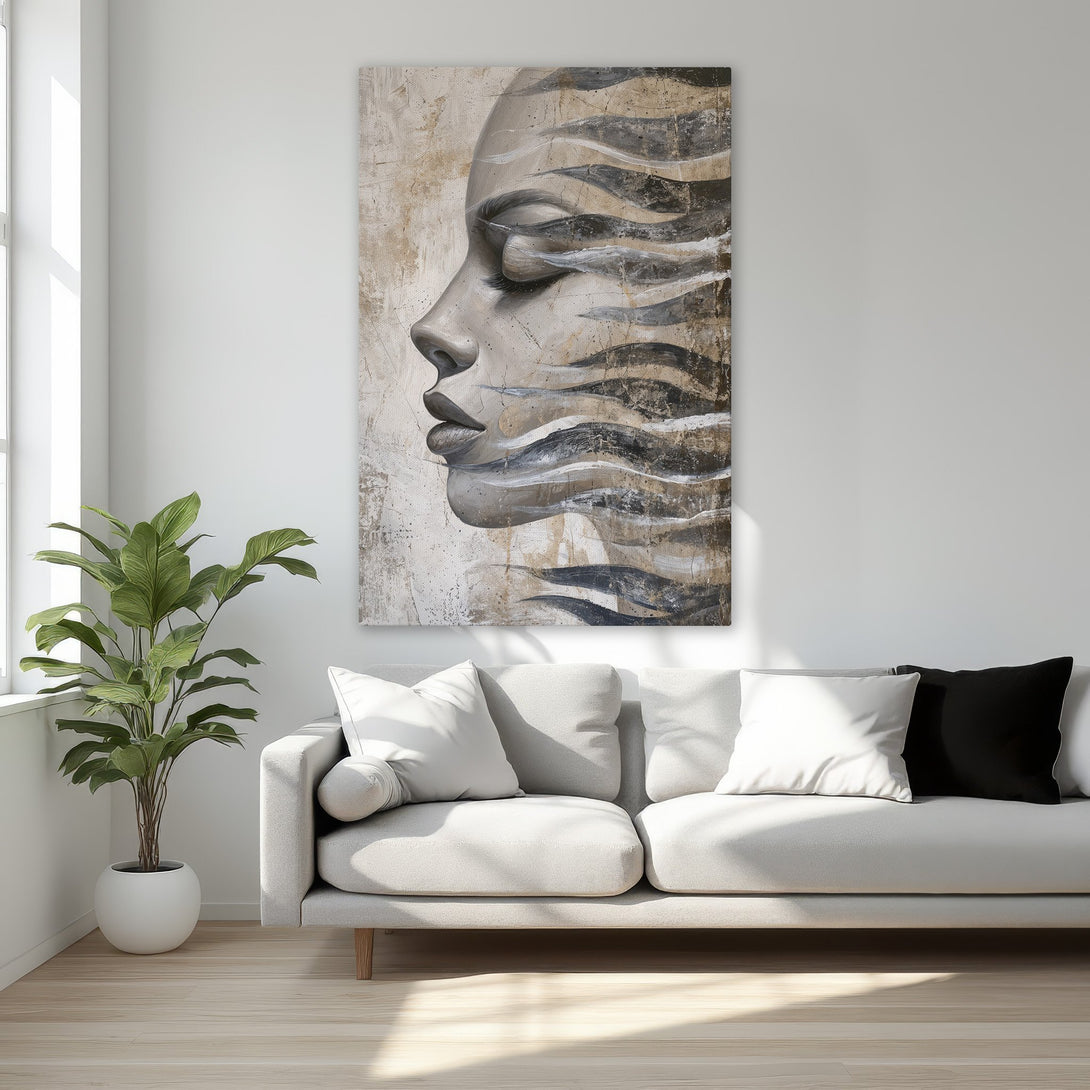 Framed Wall Art featuring a serene woman's face in a modern abstract style. Neutral color palette with gold frame, perfect for bedroom decor.