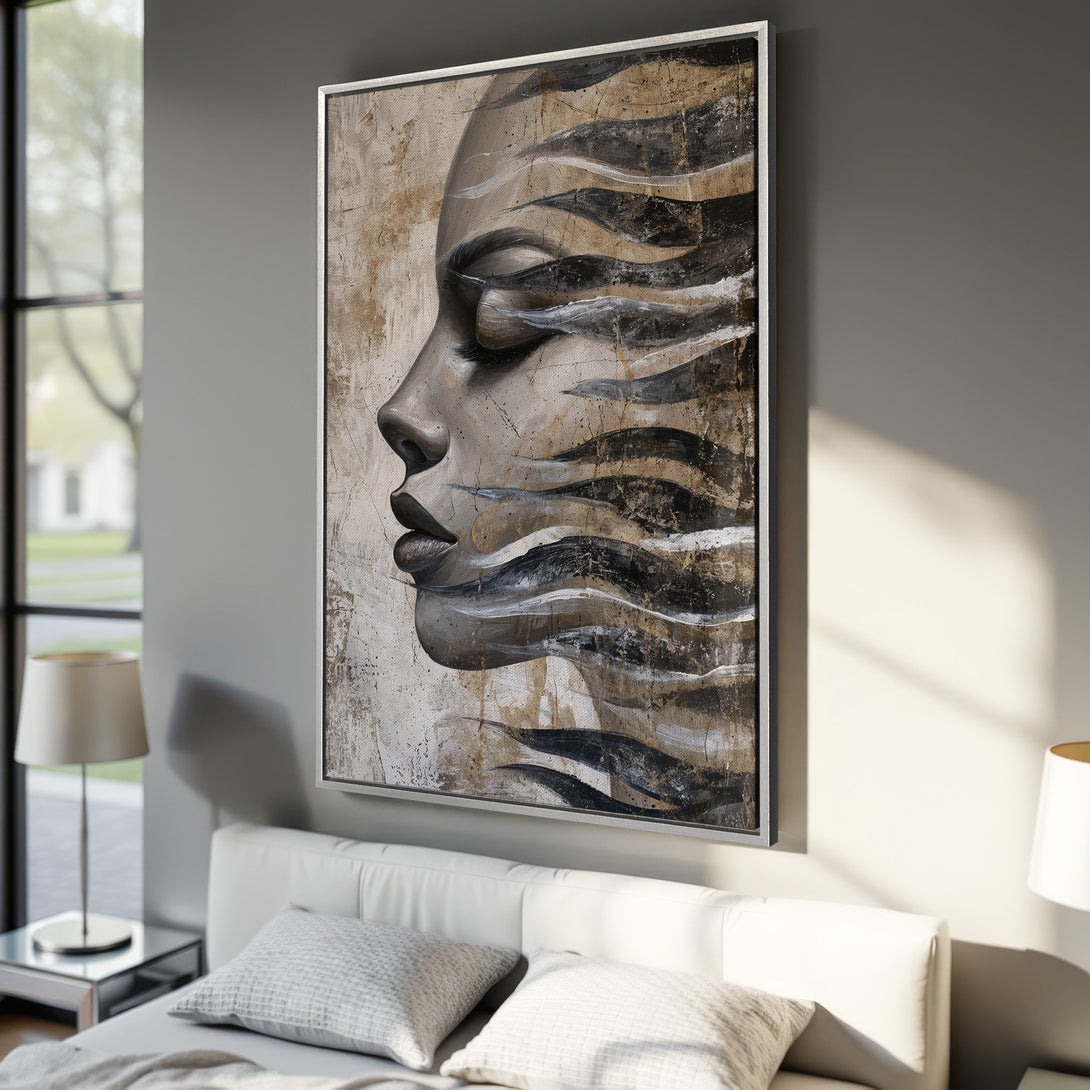 Framed Wall Art: Abstract portrait canvas print in neutral tones. Modern art for bedroom decor. Features a woman's face with a beige, black, and white color palette.