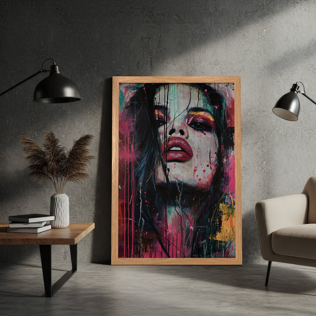 Framed Poster featuring a striking woman's portrait in vibrant pink, red, and black abstract style. Add a pop of art to your space!