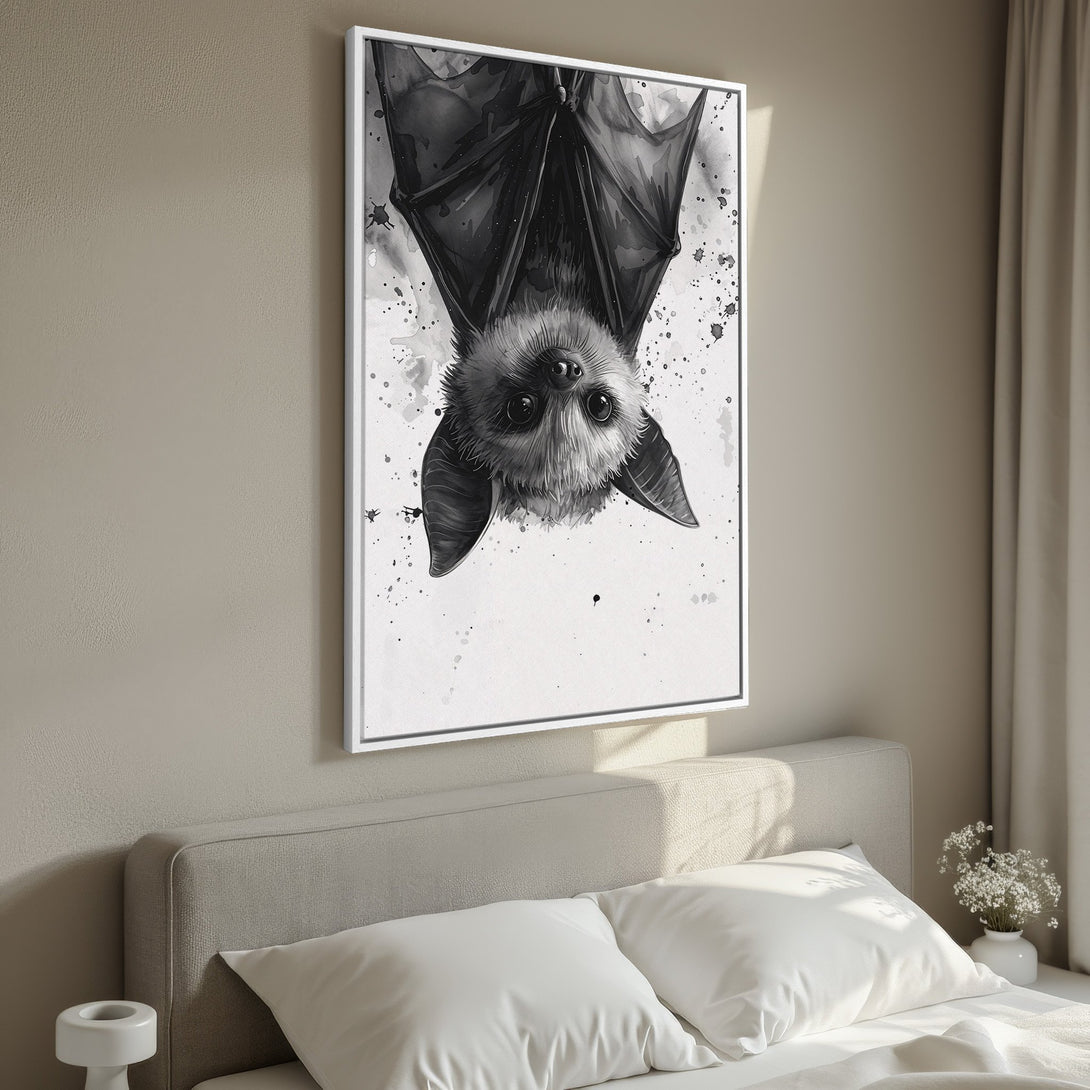 Framed Wall Art featuring an adorable watercolor bat in black and white. Perfect for adding a touch of whimsy to your bedroom decor.