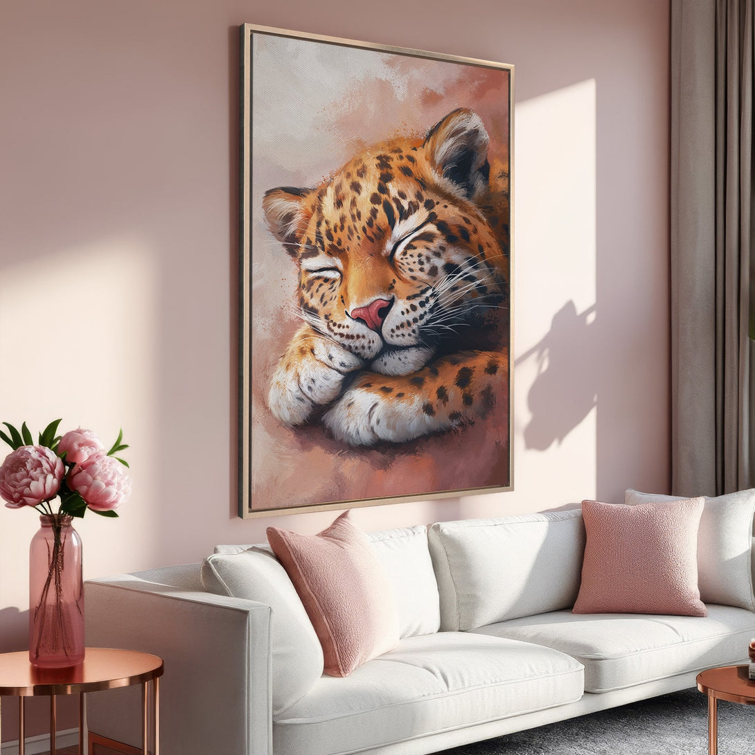 Framed Wall Art: Sleeping Leopard Canvas Print in warm orange and pink tones. Perfect for adding a touch of cozy elegance to your home decor.