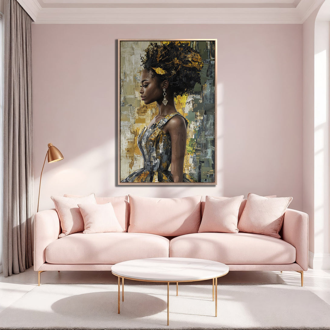 Framed Wall Art: Abstract portrait of a woman with gold accents. Modern art in a gold frame, displayed in a blush pink interior.