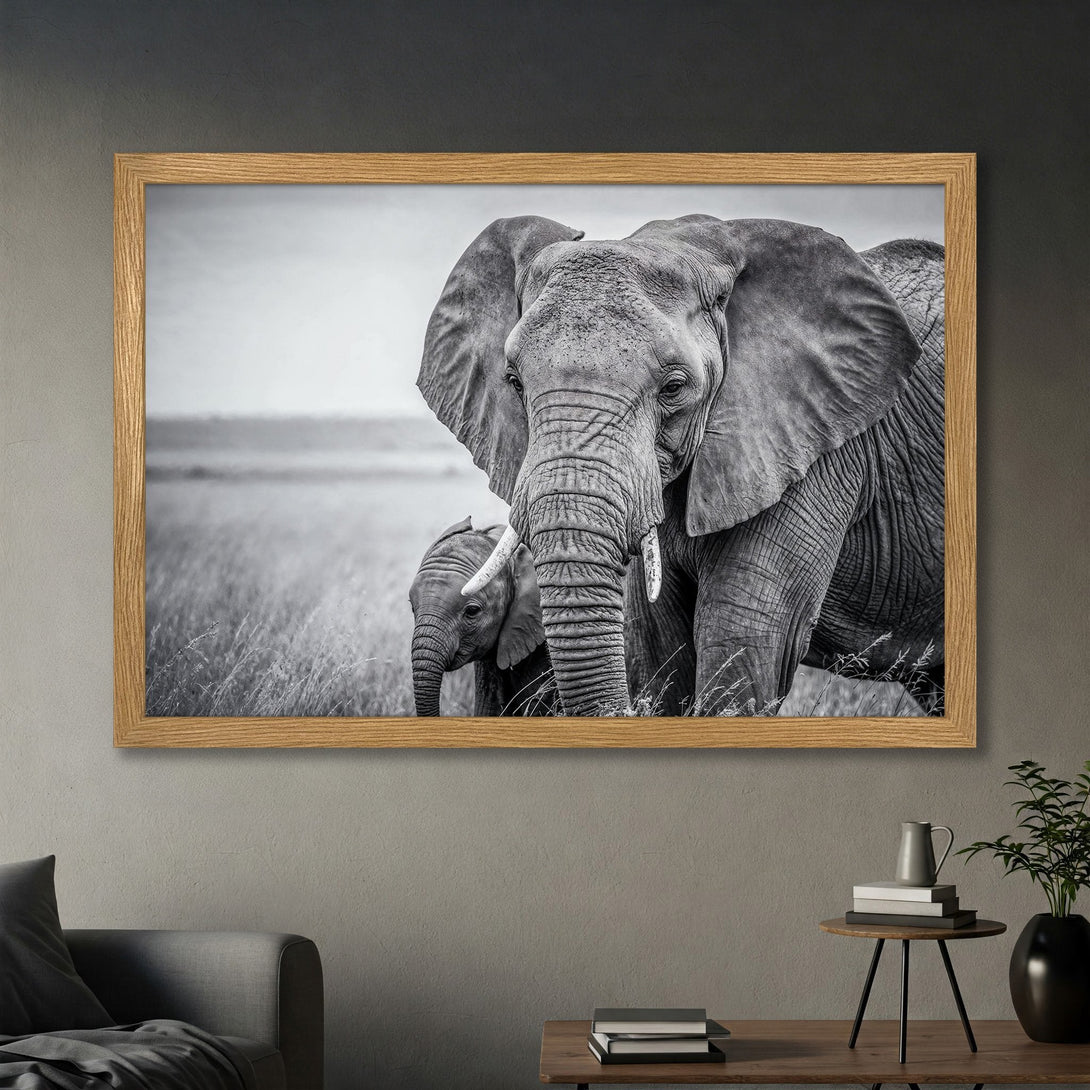 Framed Poster featuring a majestic elephant and calf in a black and white photographic style. Perfect for adding a touch of wildlife art to your home.