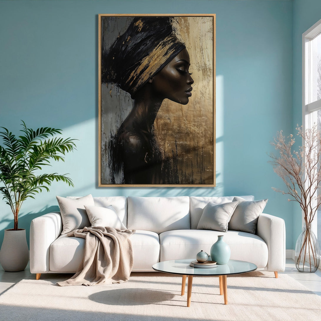 Framed Wall Art featuring an elegant woman in black and gold, displayed in a modern living room with a blue and neutral color palette.