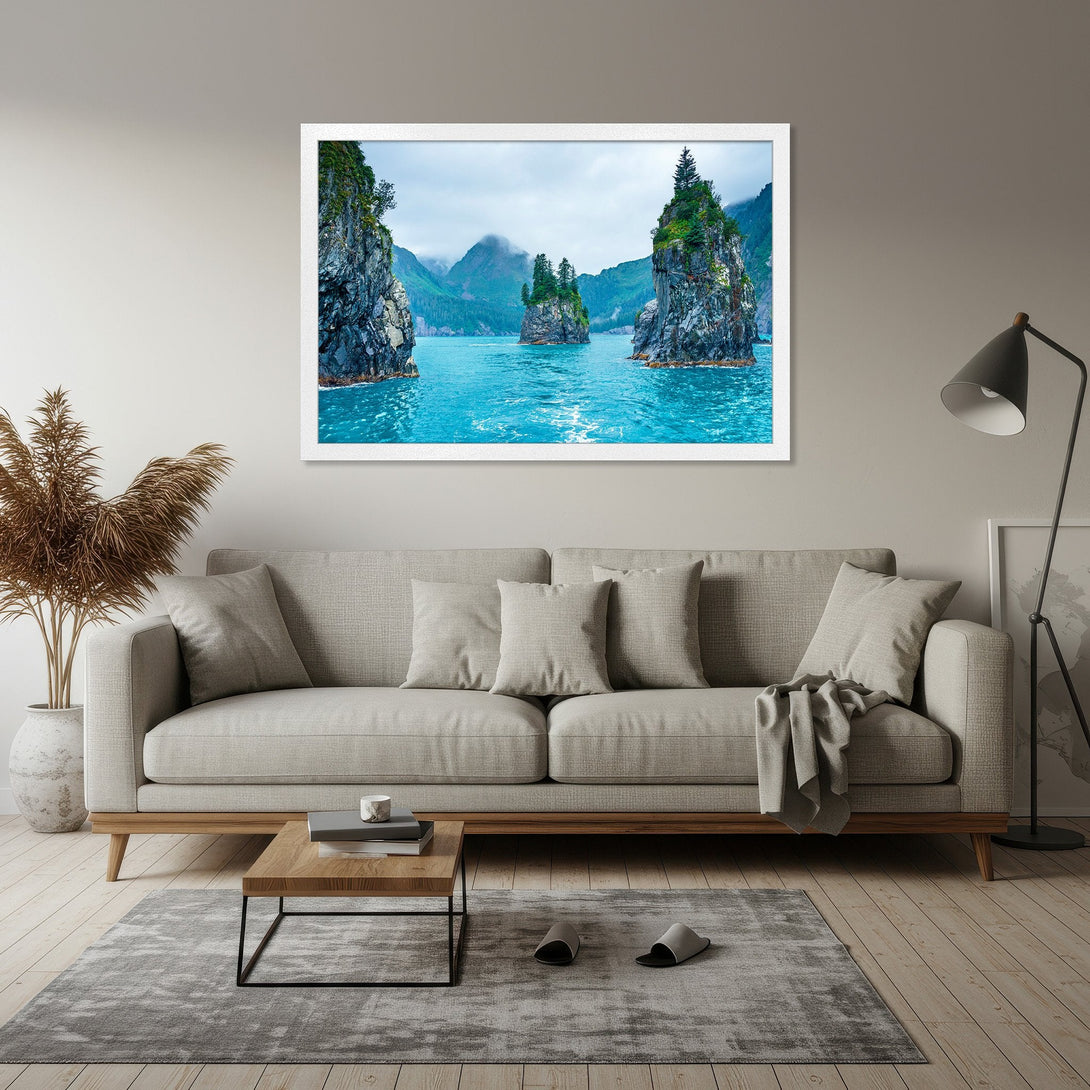 Framed Poster of a stunning seascape with turquoise water and rocky islands. Nature-inspired art in blue, green, and gray tones. Perfect wall decor.