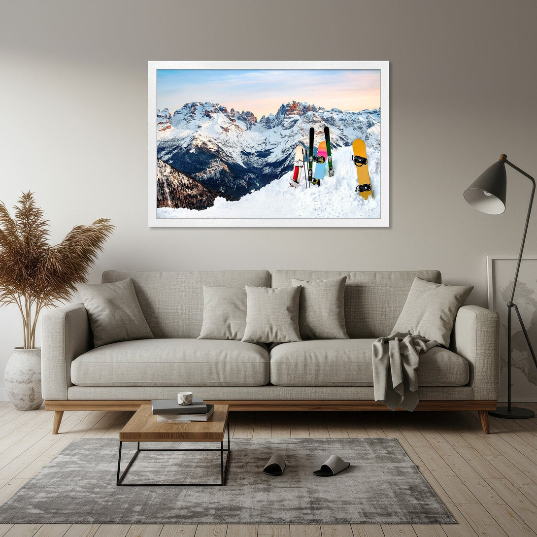 Framed Poster of snowy mountain landscape with skis and snowboards, showcasing a natural, neutral color palette for home decor.