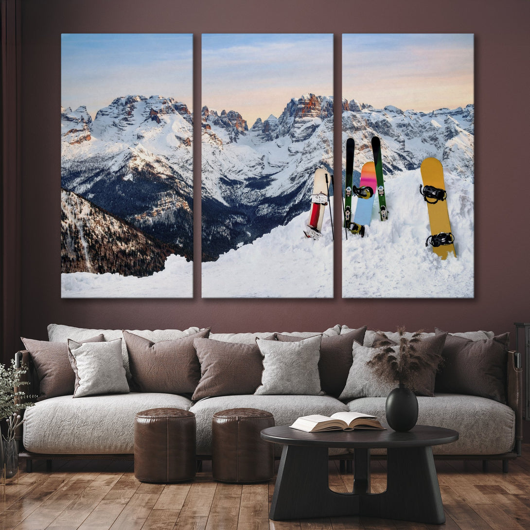 Canvas Print of snowy mountain landscape with skis and snowboard, featuring a cool blue and white color palette, perfect for your home decor.