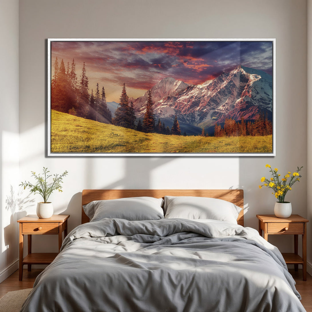 Framed Wall Art: Majestic mountain landscape Canvas Print. Warm, vibrant colors of sunset over snow-capped peaks. Perfect for bedroom decor.