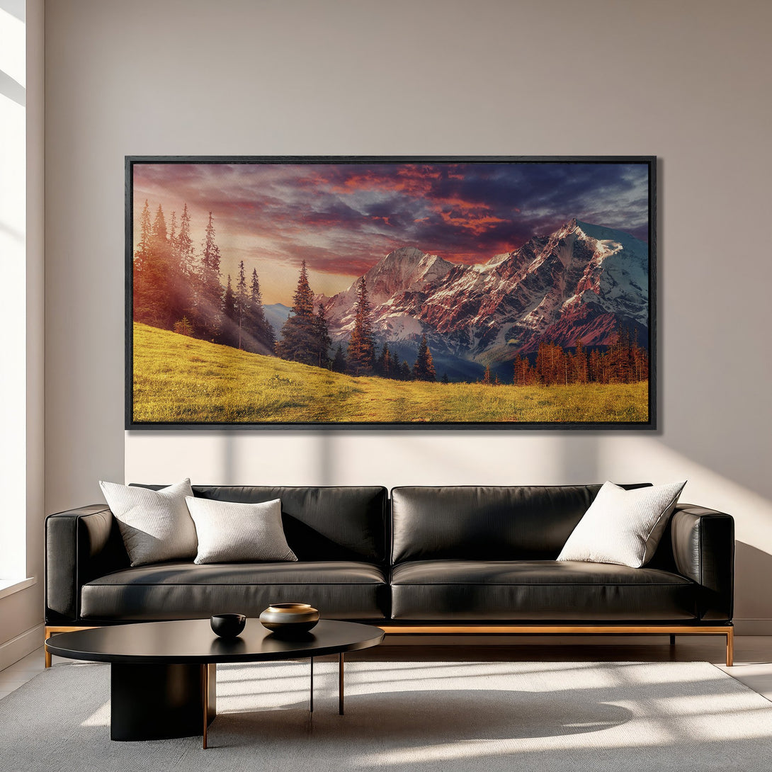Framed Wall Art: Majestic mountain landscape Canvas Print with vibrant red, yellow, and blue hues. Perfect for adding a touch of nature to your living room.
