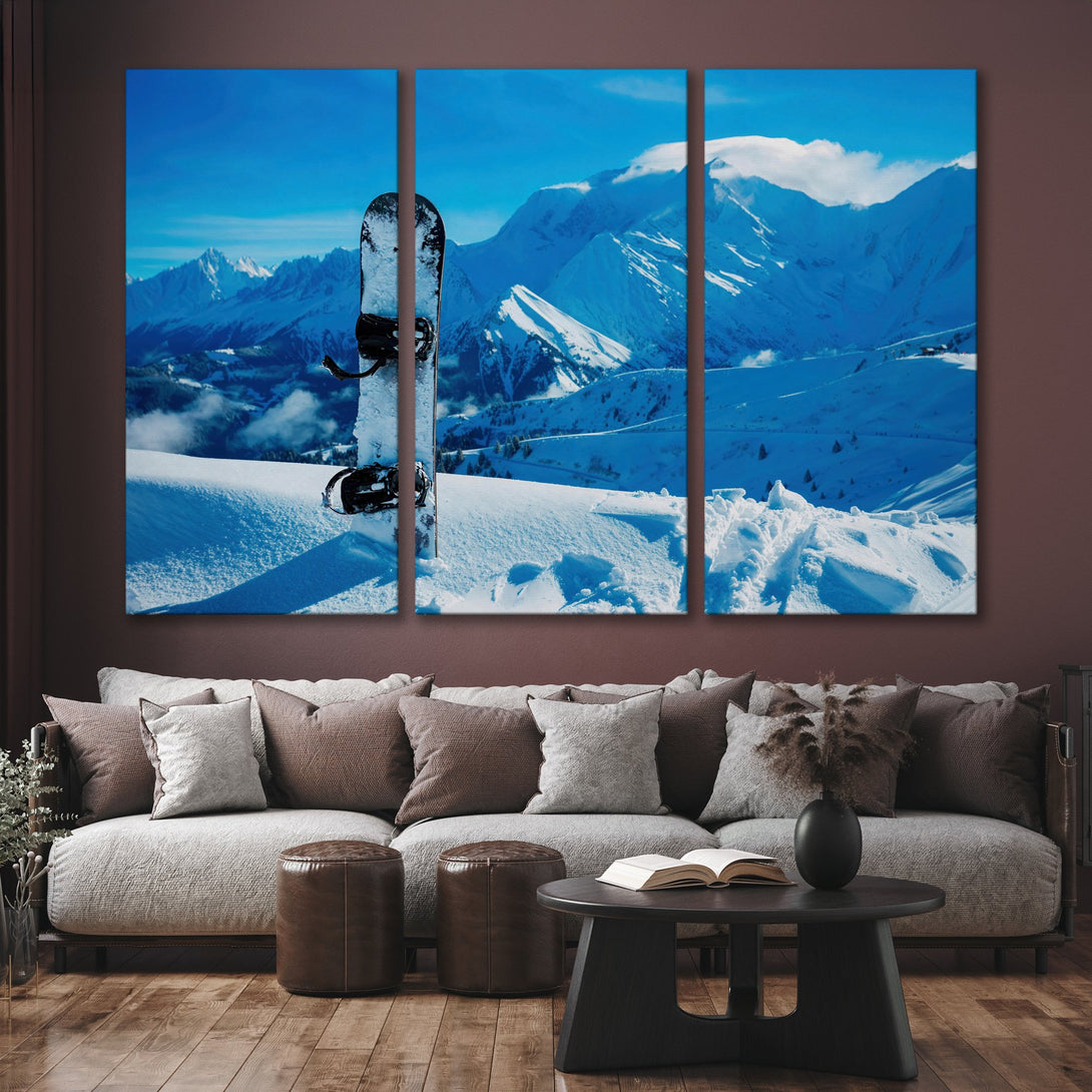 Canvas Print of a snowy mountain landscape with a snowboard. Stunning blue and white color palette, perfect for any room.