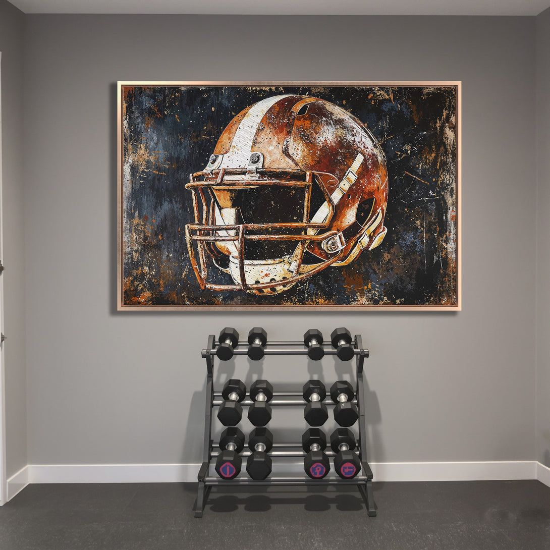 Framed Wall Art: Abstract football helmet art in rustic orange and navy blue. Perfect for a home gym or sports-themed space. Shop now!