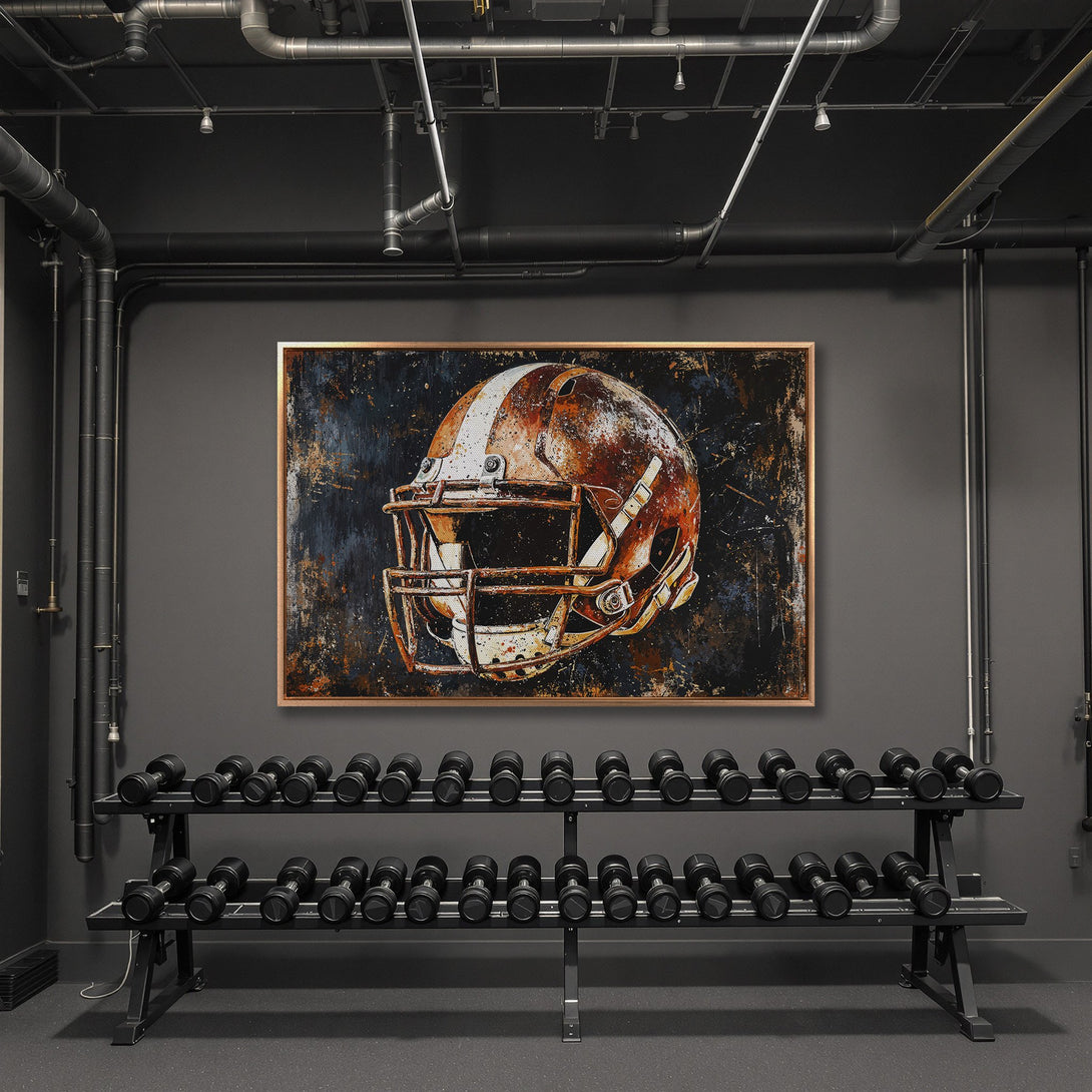 Framed Wall Art: Abstract football helmet canvas print in a gym setting. Rustic style with a warm, orange and blue color palette. Elevate your space!