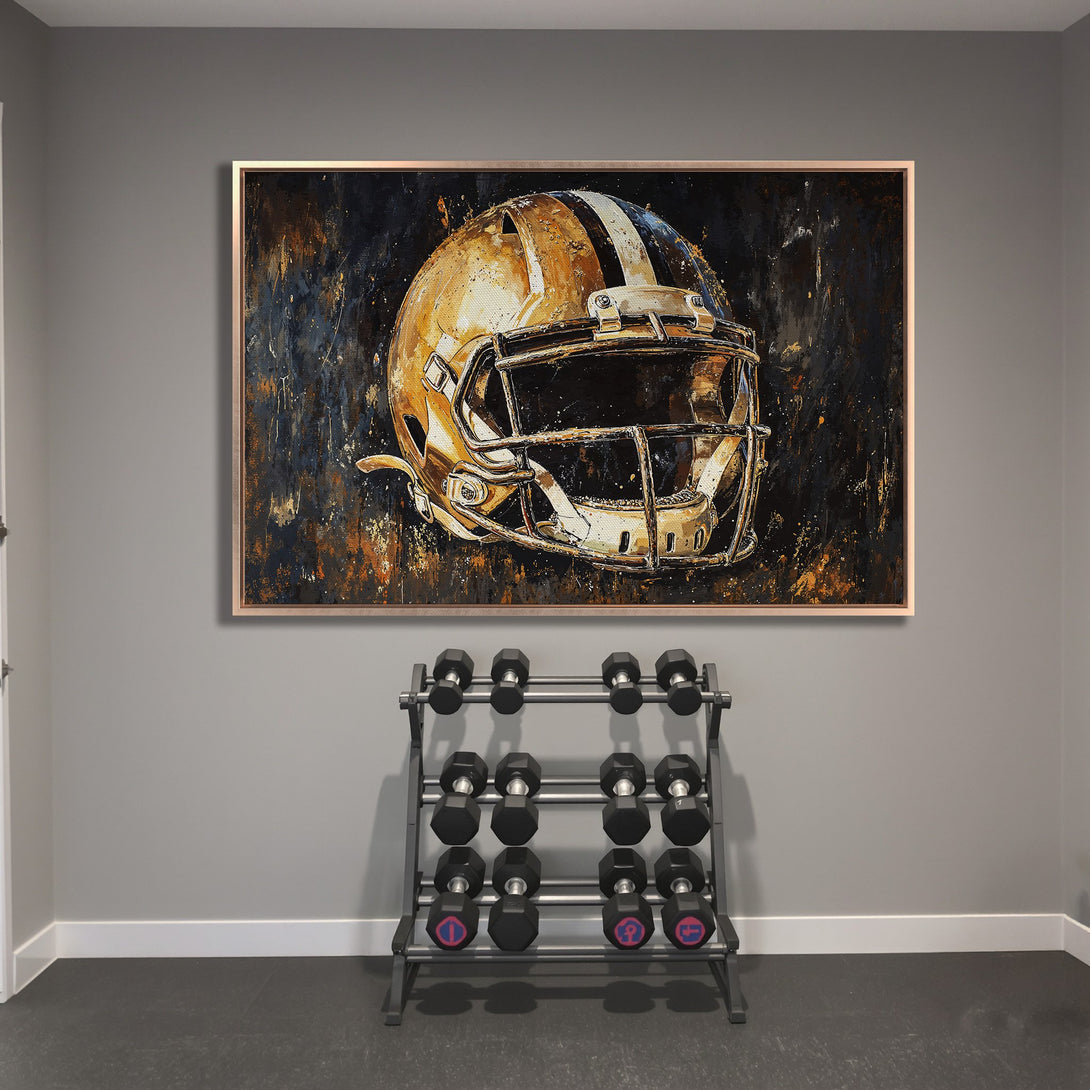 Framed Wall Art: Abstract football helmet art in gold and black. Adds a touch of sporty style to any space. Shop now!