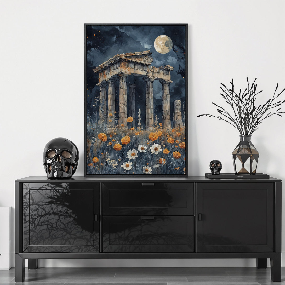 Framed Wall Art featuring a watercolor painting of an ancient temple under a moonlit sky. Moody, dark blue and gold color palette. Perfect for adding a touch of history.