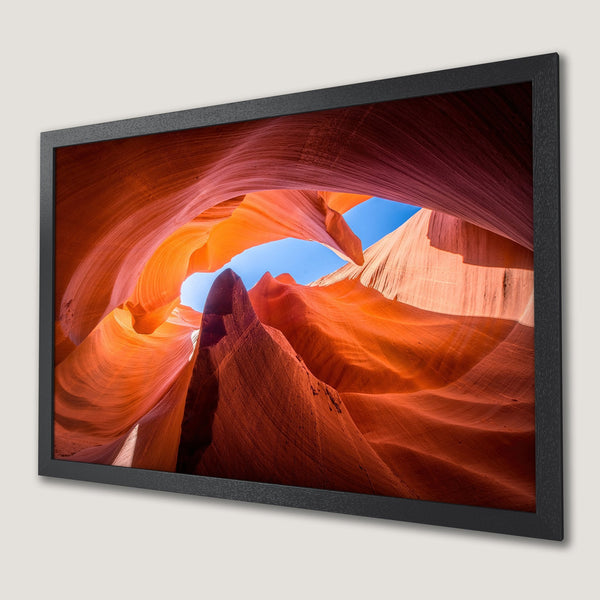 Framed Poster of Antelope Canyon, vibrant orange and red hues, artistic landscape print.