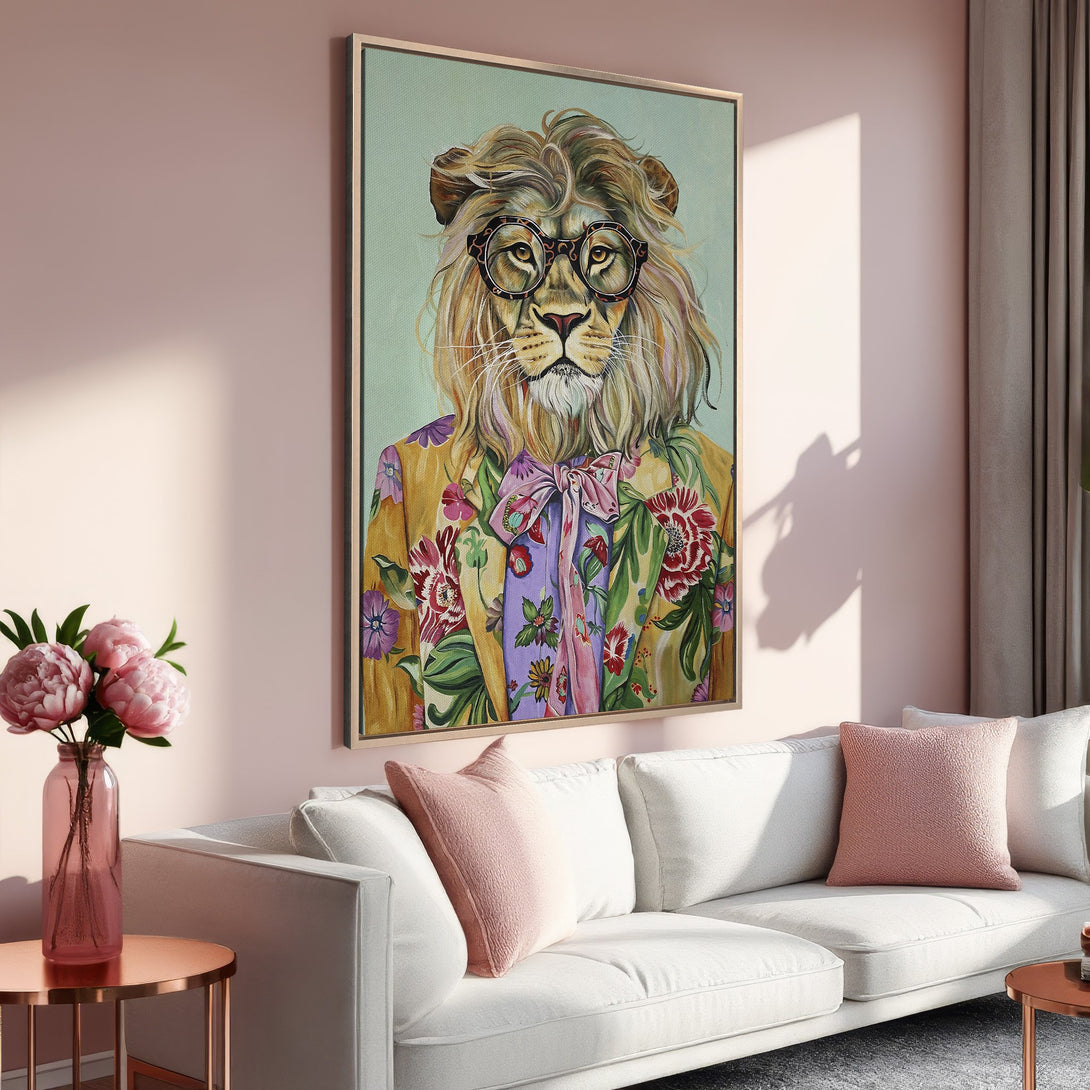 Framed Wall Art of a lion in glasses and floral jacket, perfect for adding a touch of whimsy to your home decor. Featuring a warm, pink color palette.