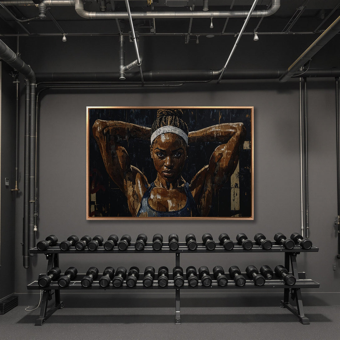 Framed Wall Art: Powerful woman portrait canvas print in a gym setting. Earth tone palette with a touch of blue. Inspiring wall decor for your home.