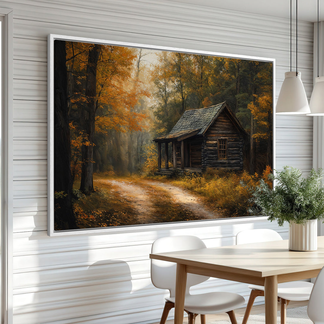 Framed Wall Art: Rustic cabin scene in warm autumn colors. This canvas print adds cozy charm to any space. Perfect for nature lovers!