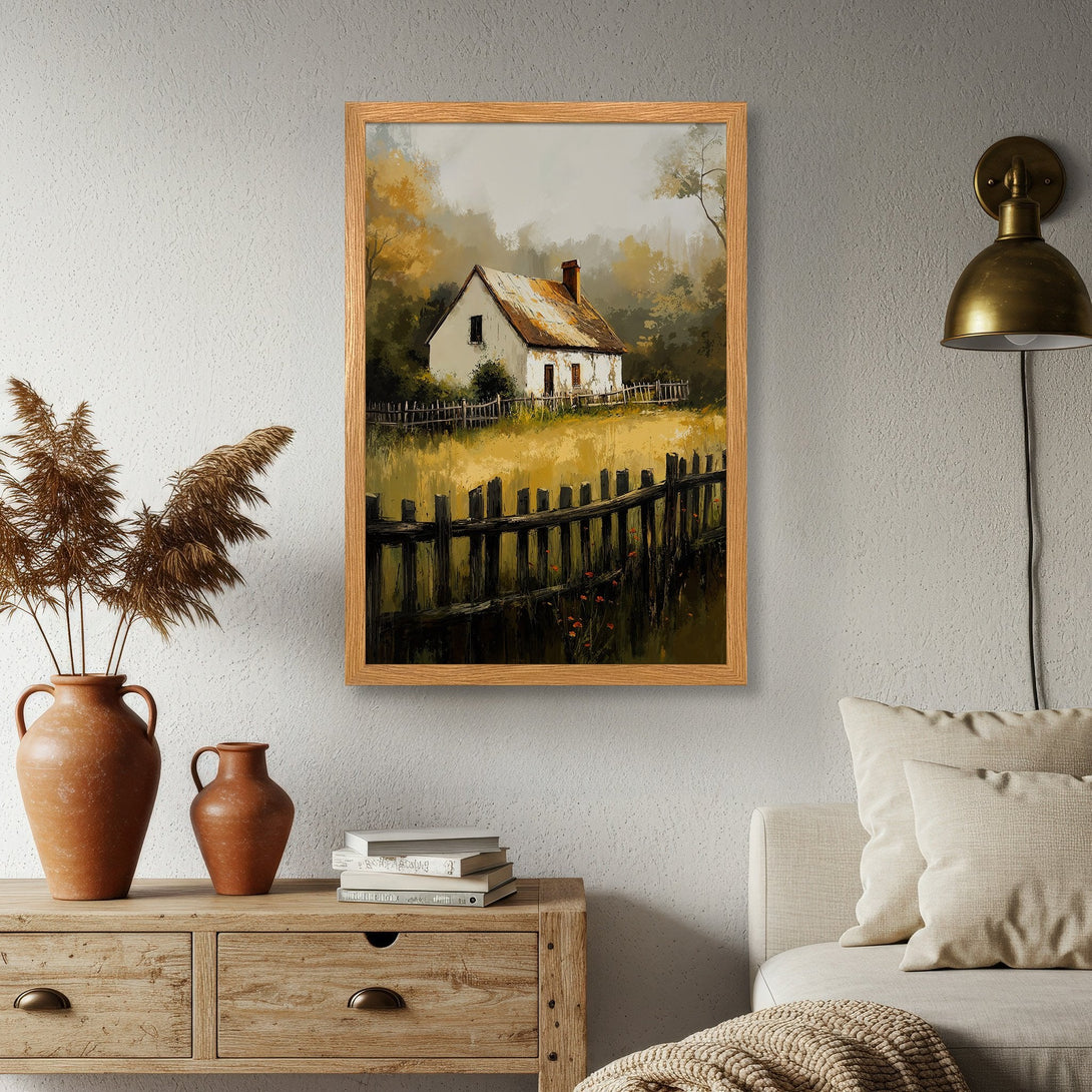Framed Poster of a rustic cottage in a warm, autumnal color palette. Perfect wall art for a cozy, inviting home.