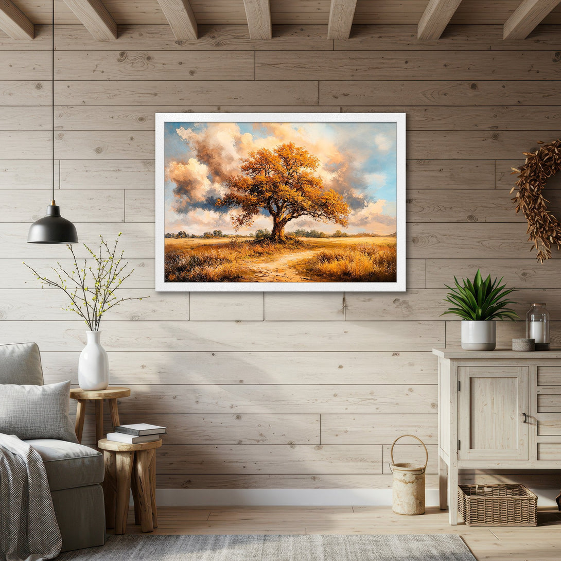 Framed Poster of a vibrant autumn tree in a field, painted in a warm, impressionistic style with a golden color palette.
