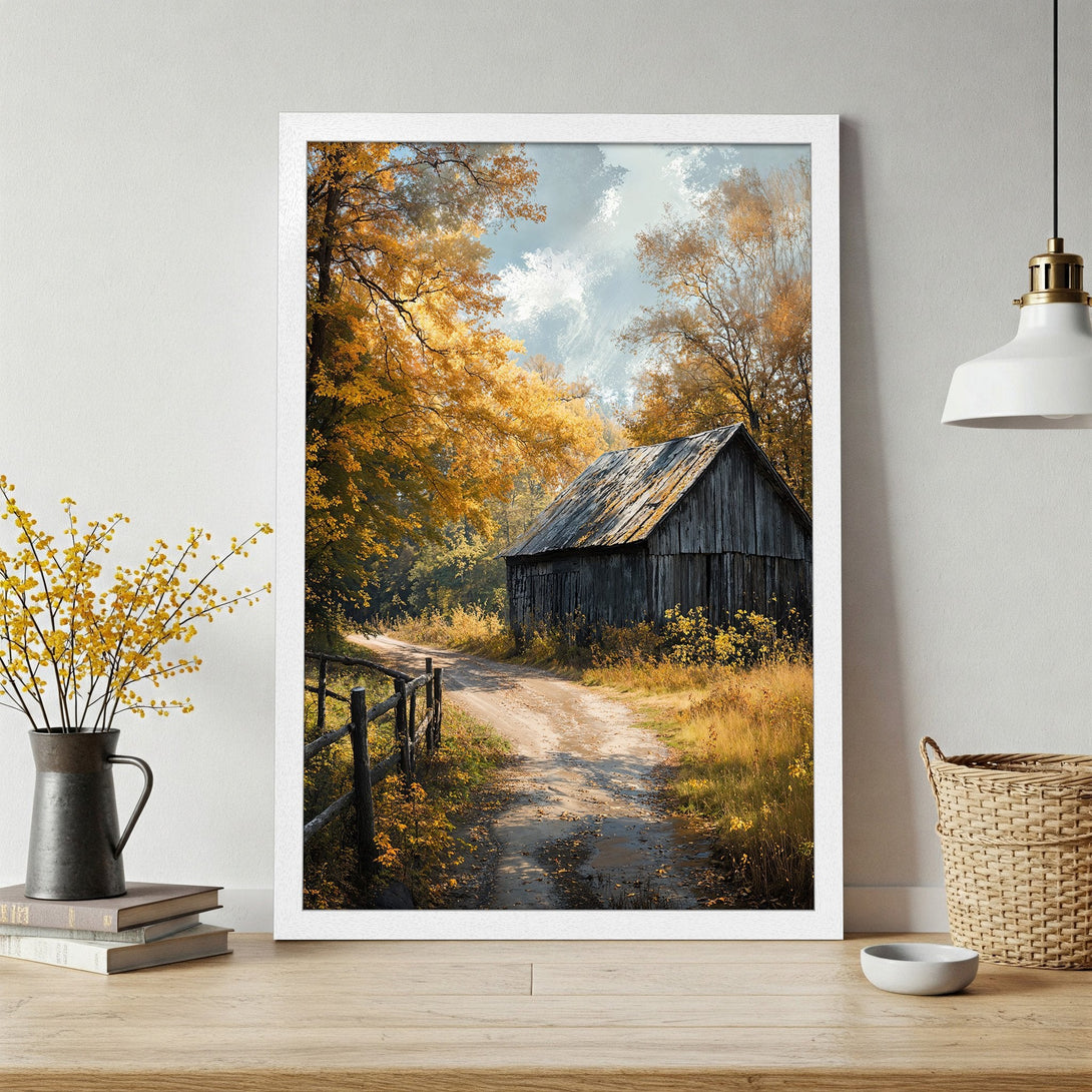 Framed Poster of a serene autumn landscape with a barn, featuring warm yellow and brown tones. Rustic art for your home.