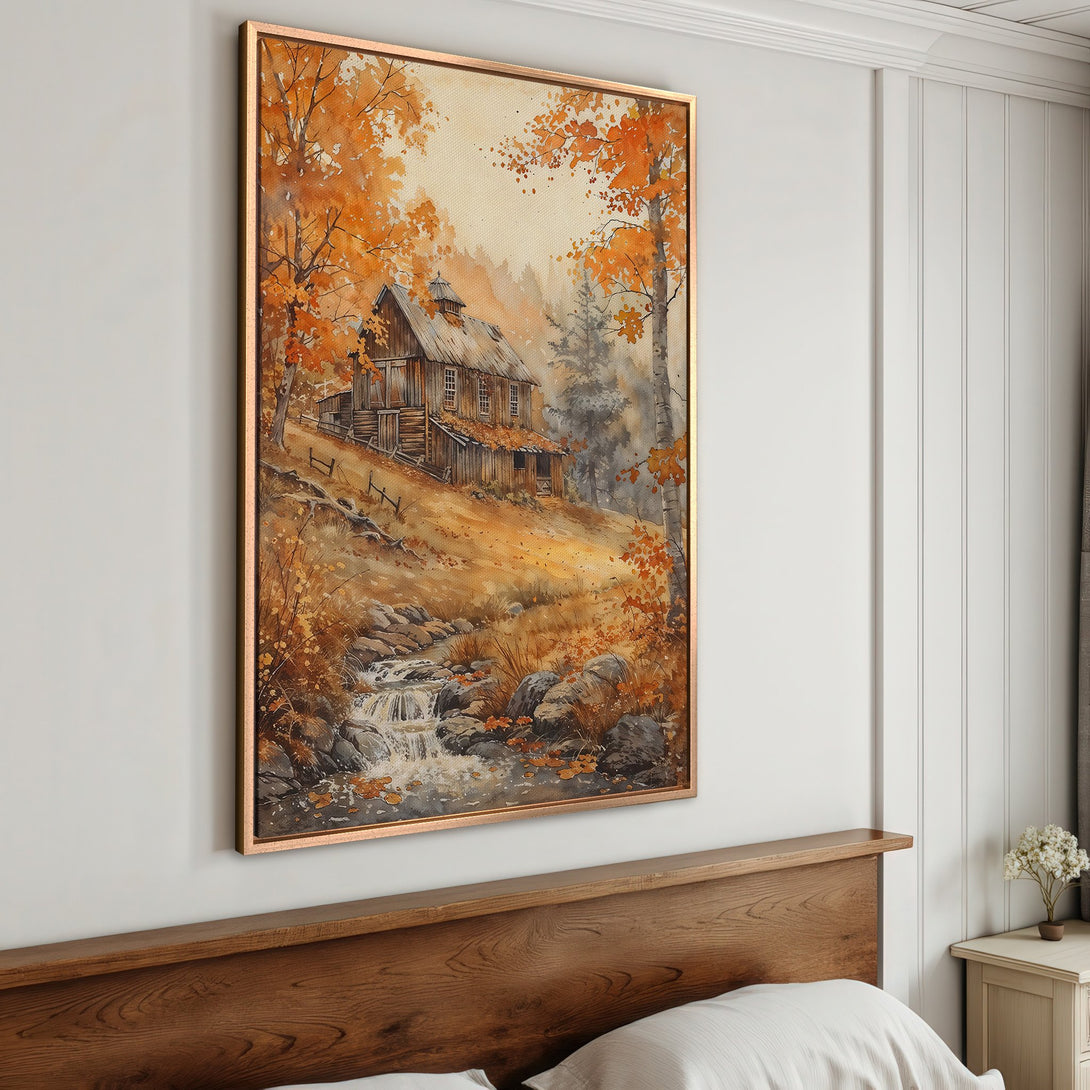 Framed Wall Art of a rustic cabin in autumn. Watercolor style with warm orange and brown tones. Perfect for cozy home decor.
