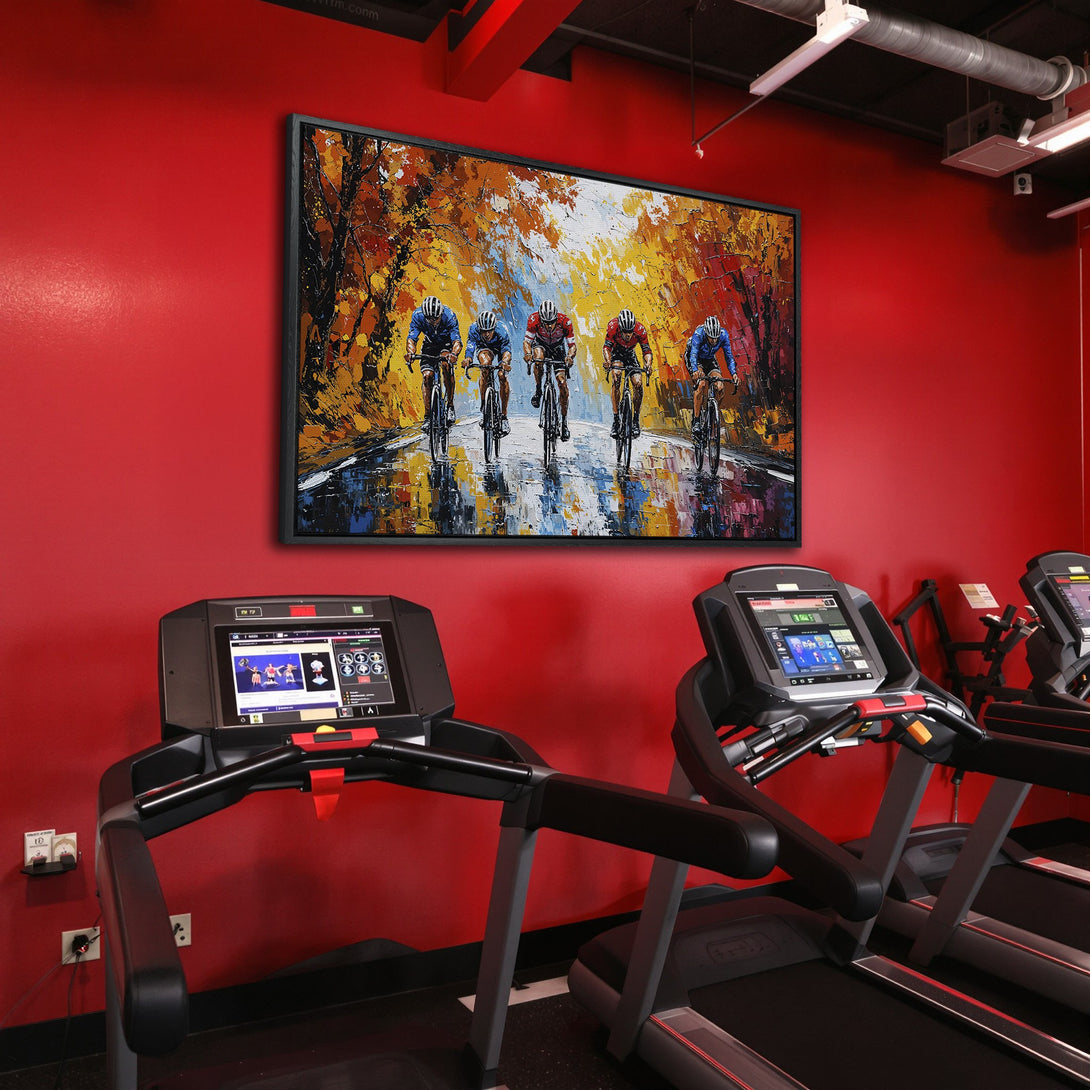 Framed Wall Art: Cyclists in vibrant autumn landscape. Oil painting style with warm yellow, orange, and blue hues. Perfect for home or gym decor.