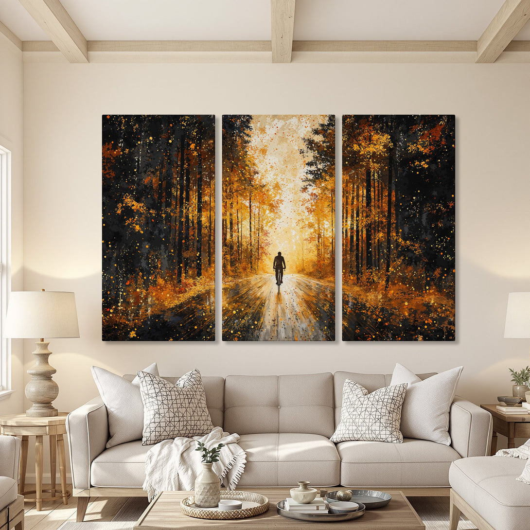Abstract Canvas Print of a cyclist on a road through a forest, warm orange and black color palette, perfect for home decor.