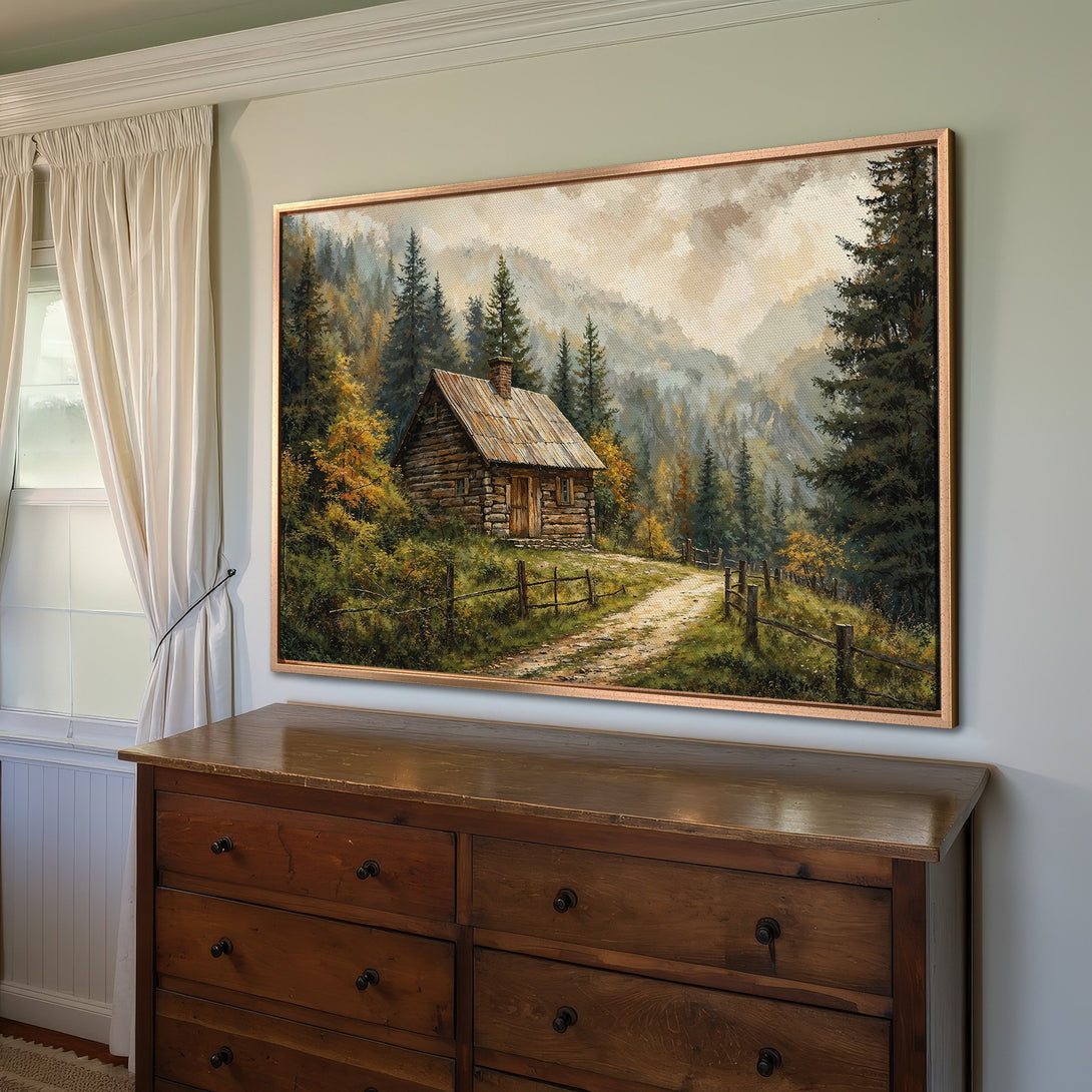 Framed Wall Art: Rustic cabin landscape painting in warm earth tones. Perfect for adding a cozy, natural touch to your home decor.