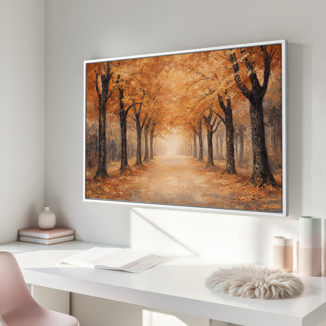 Framed Wall Art featuring an autumn forest scene in warm orange and brown tones. Perfect for adding a touch of nature-inspired art to your home decor.