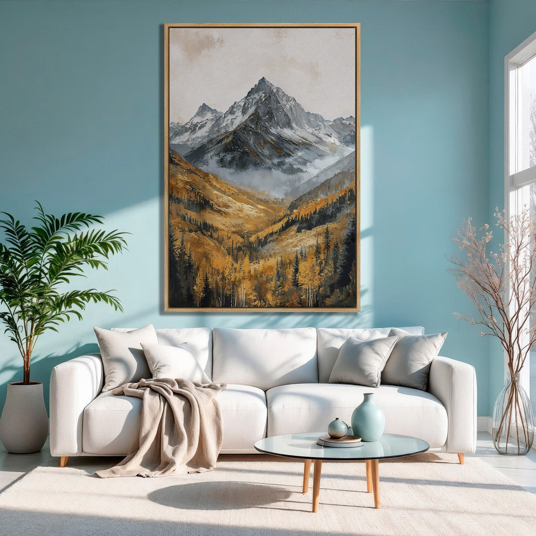 Framed Wall Art: Mountain landscape canvas print in warm gold, gray, and white tones. Adds a touch of nature to any living room!