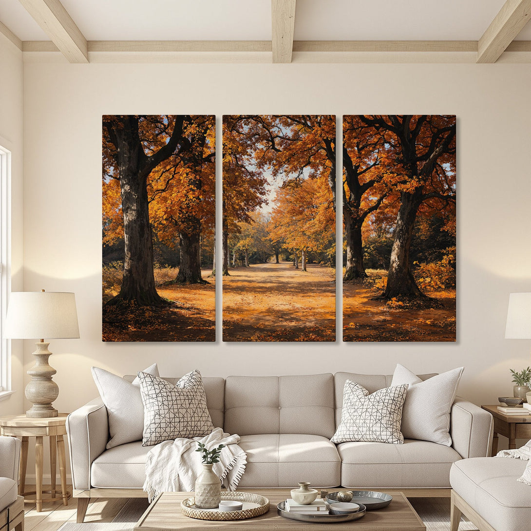 Canvas Print of autumn trees in warm orange tones, perfect for adding a touch of nature and cozy style to your living room.